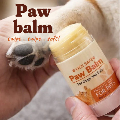 Nose & Paw Balm stick on a dog's paw